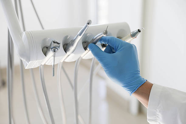 Professional Emergency Dentist technician working in Bellmore, NY